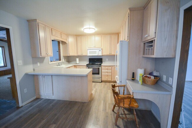 Building Photo - Abundant space & storage throughout this u...
