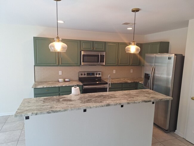 Building Photo - Wonderfully Remodeled Three Bedroom Home i...