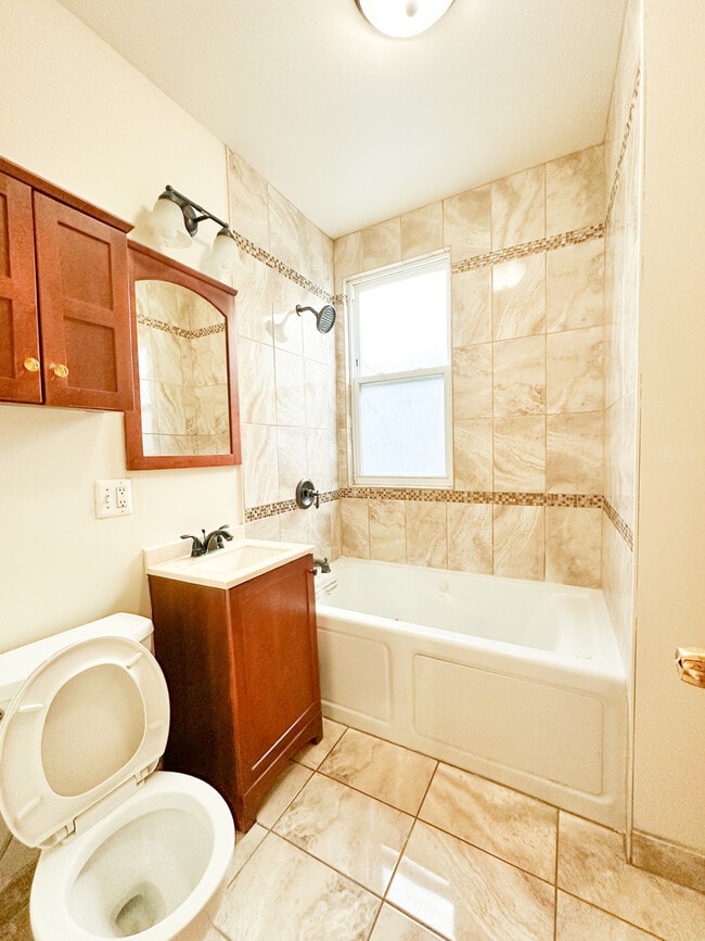 Building Photo - 7532 S Vernon Ave