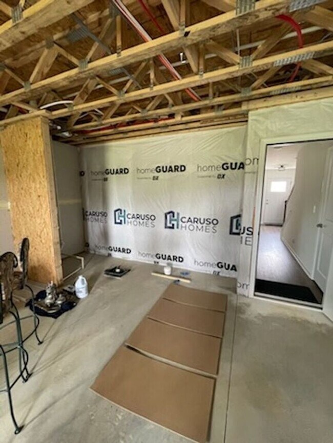 Building Photo - Scenic 3-Bed Townhome with Screened Porch, First Floor Storage & 1-Car Garage – Overlooking the G...