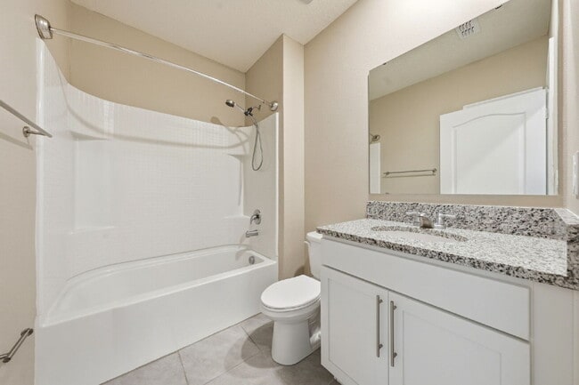 Building Photo - Three Bedroom, 2 Bathroom single family home with 2 Car Garage.