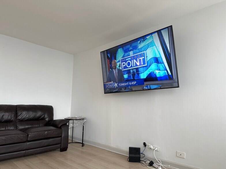 Wall mounted television - 655 W Irving Park Rd