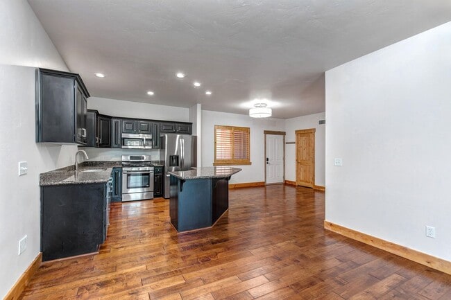 Building Photo - Unfurnished Condo Retreat with Modern Comf...