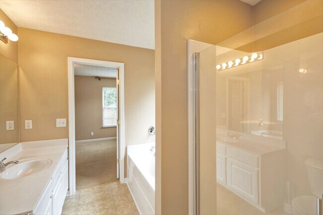 Building Photo - Former model home in highly sought after B...