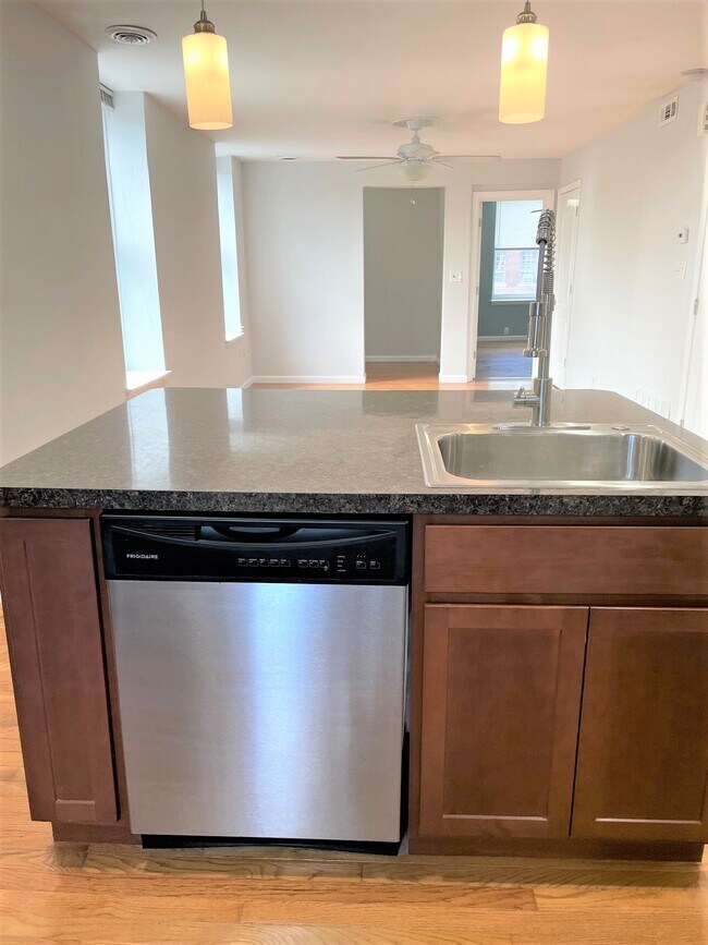 Kitchen view of living room - 4201 Russell Blvd