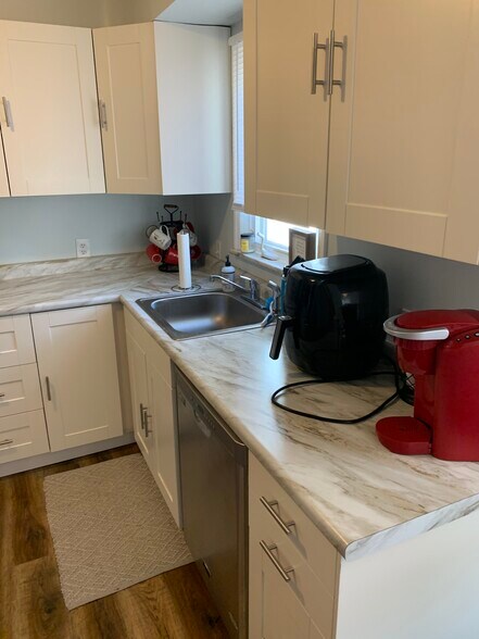 Kitchen area - 4302 Silsby Rd