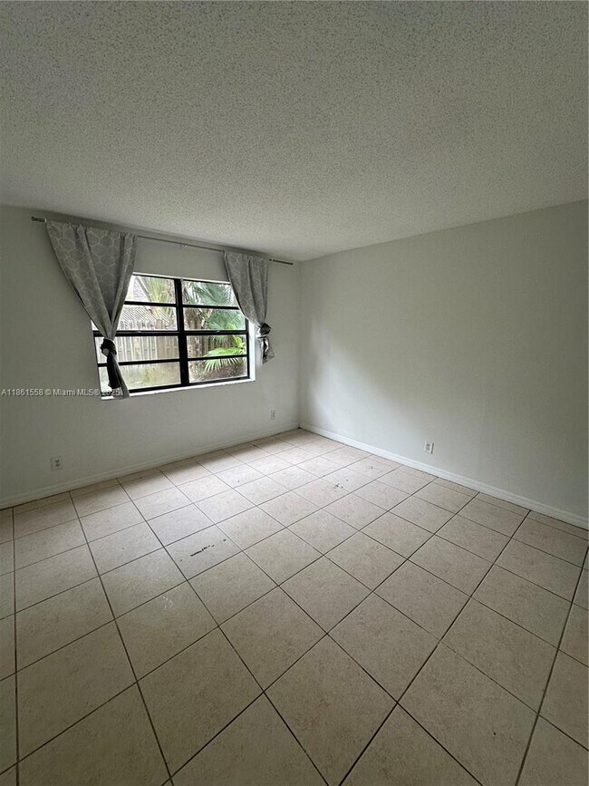 Building Photo - 11213 Royal Palm Blvd