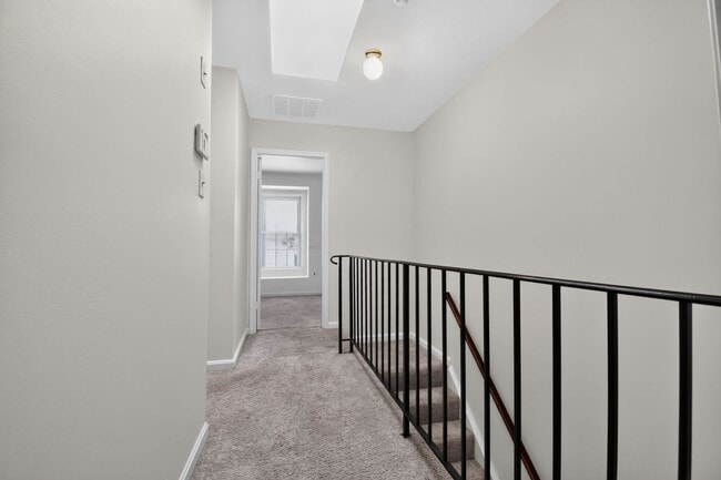 Building Photo - Welcome home to this light-filled, updated 4Bd/3.5Bth brick TH nestled in the sought-after Boniwo...