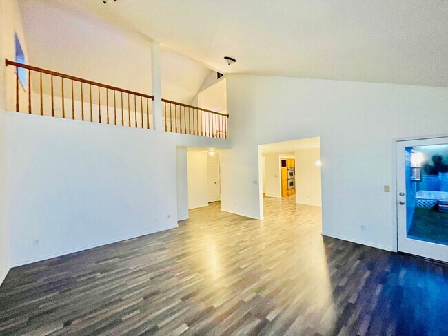 Building Photo - Luxurious 4-Bedroom Retreat with Mount Rai...