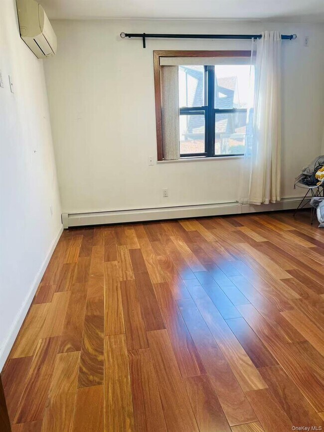 Building Photo - 62-54 Dry Harbor Rd