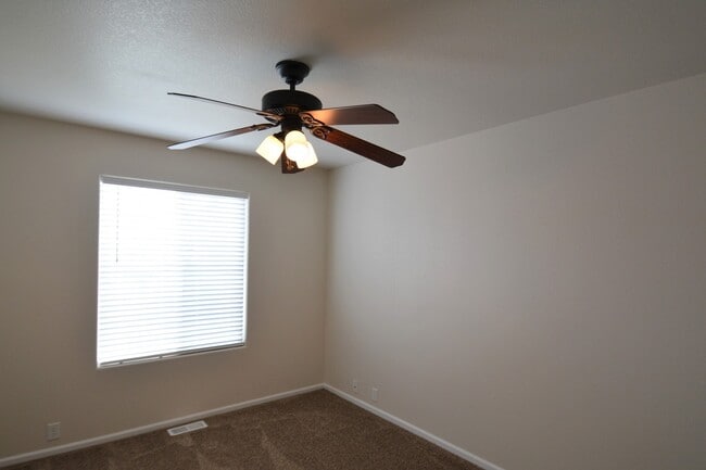 Building Photo - Beautiful townhome near Ft. Carson available to move in!