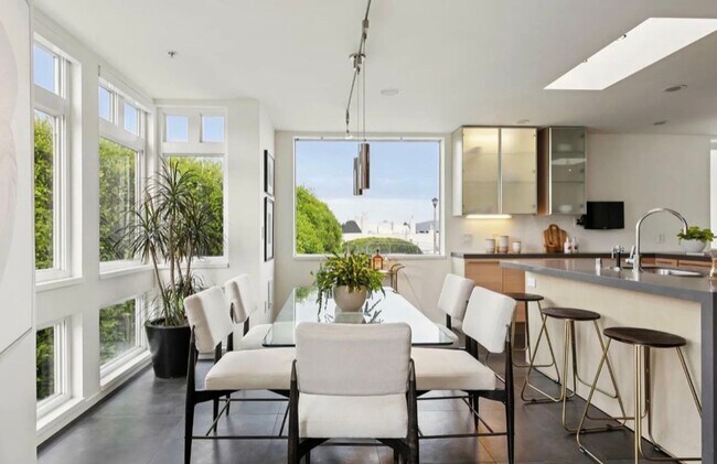 Building Photo - One-of-a-Kind Sophisticated Top-Floor Cond...