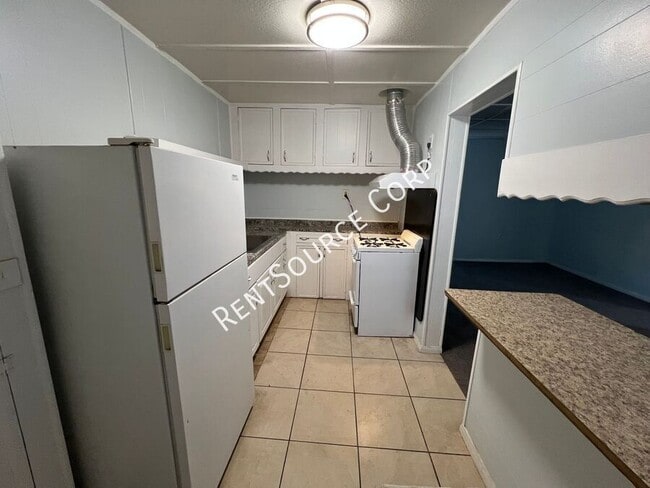 Building Photo - 1040-1042 Flora St