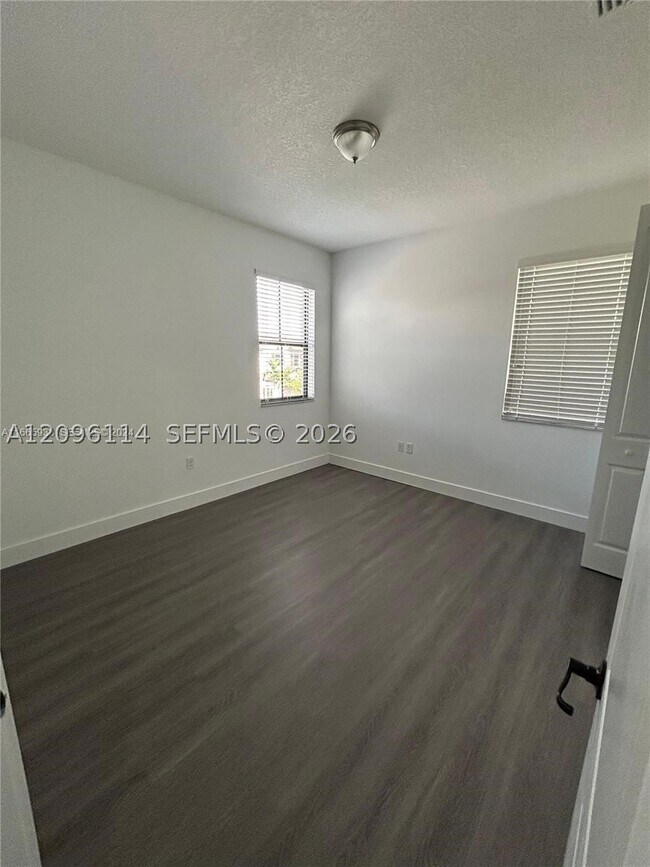 Building Photo - 9883 W 34th Ln