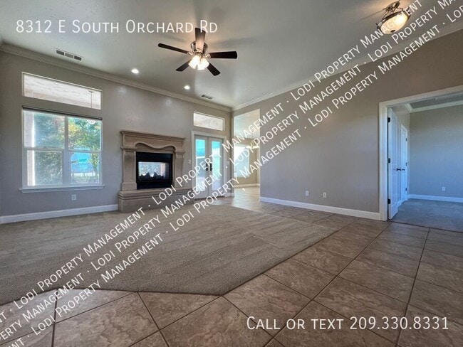 Building Photo - 8312 E Orchard Rd