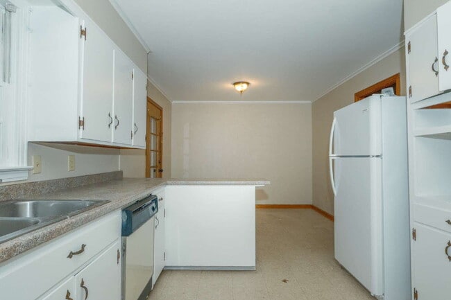 Building Photo - "Charming 3-Bedroom Greenfield Home with Gleaming Hardwood Floors – 1256 Sq Ft of Cozy Comfort!"