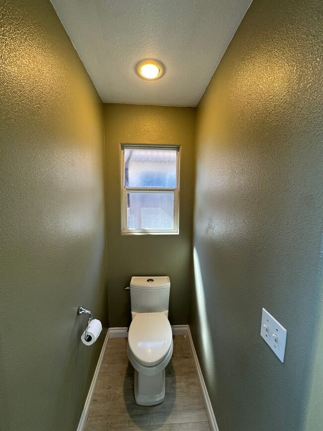 Building Photo - 4-Bedroom Home with Updated Kitchen and Co...