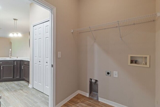 Building Photo - Executive Living Waits!