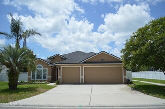 Building Photo - 4559 Plantation Oaks Blvd