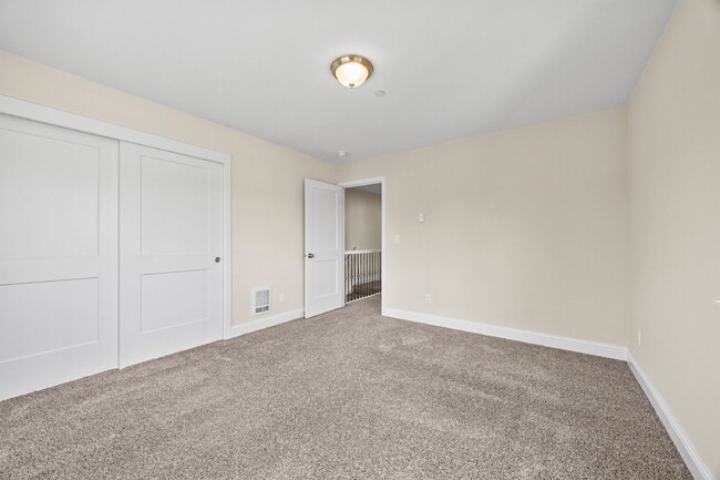 Building Photo - 4 bedrooms, 2.5 bathrooms with attached garage. This large unit is 3 floors!  Rent of $3295.00 in...