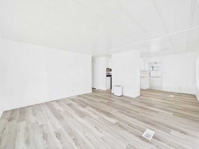 Building Photo - Completely Remodeled & Move-In Ready Home ...