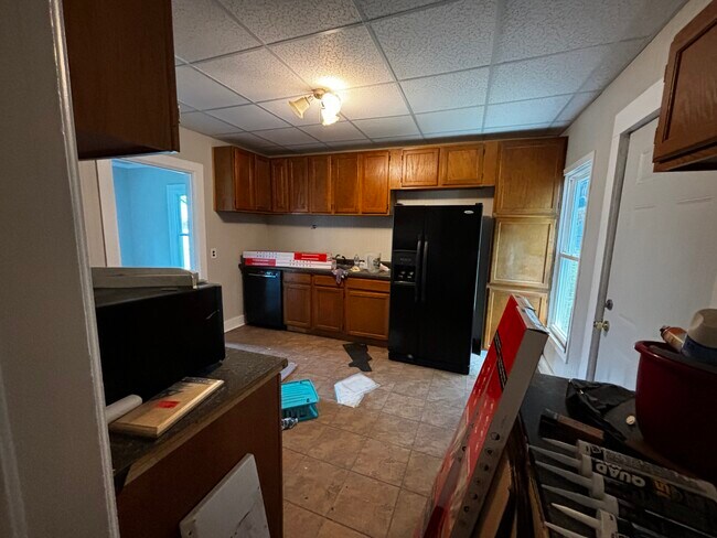 Kitchen from laundry - 420 E 2nd Ave