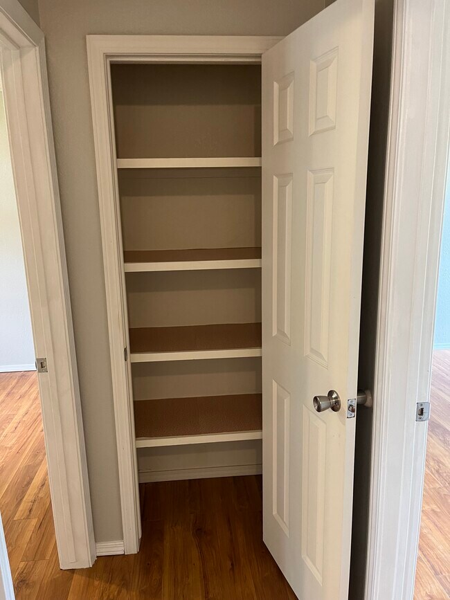 Hallway linen closet - 1004 S Dogwood St