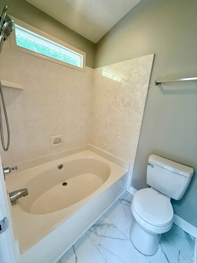 Building Photo - 3 Bedroom 2.5 Bath House + Garage + Fenced...