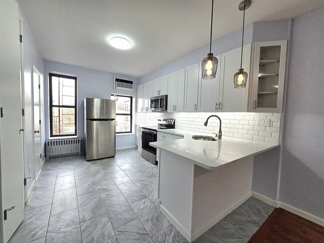 Building Photo - sunny, renovated, rent-stabilized one-bedroom apartment