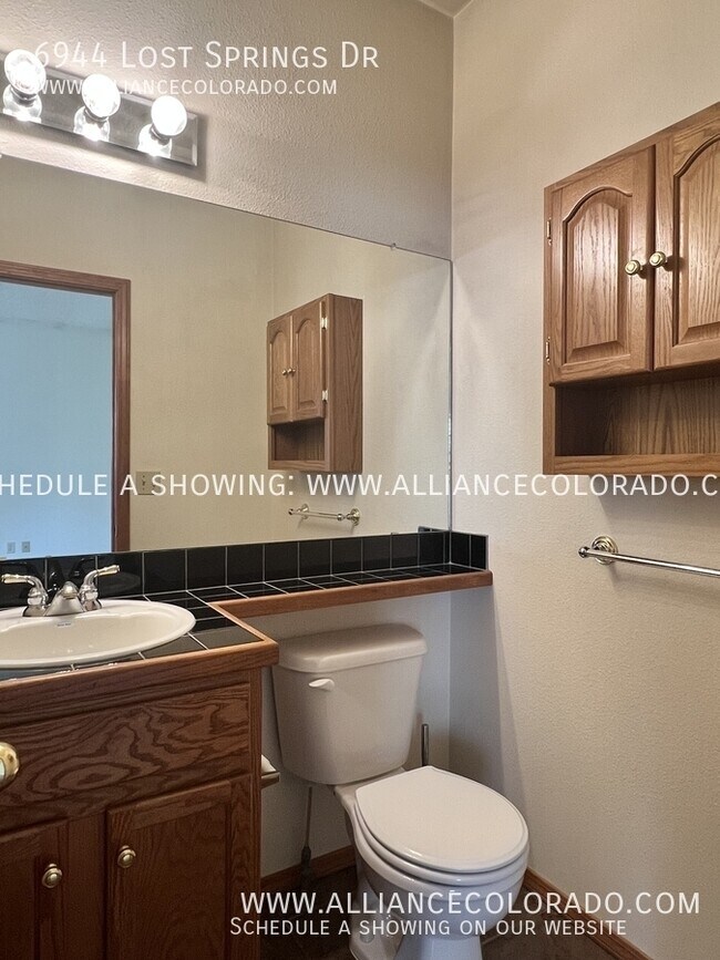 Building Photo - 6944 Lost Springs Dr