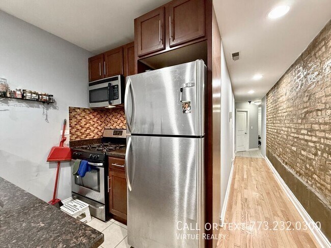 Building Photo - 5791 N Ridge Ave