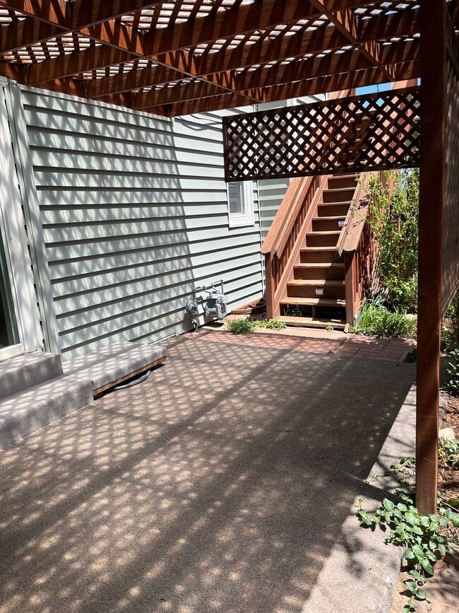 Building Photo - 4 Bedroom Gardener's Delight With Rooftop Patio, Privacy and Covered Parking