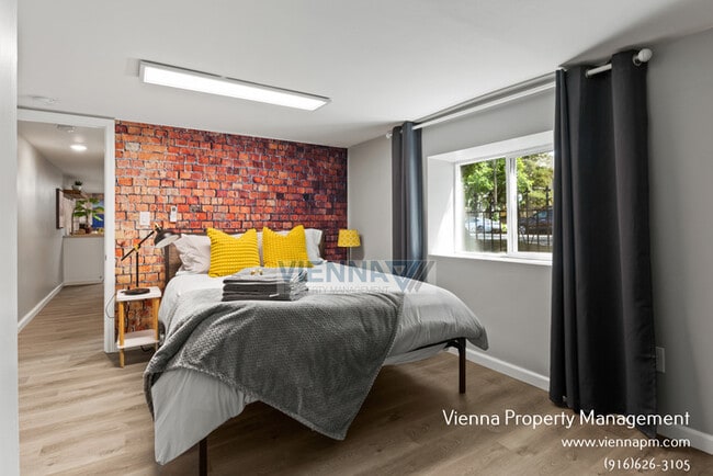 Building Photo - Downstairs Unit Available Now!