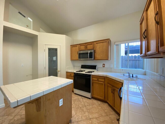 Building Photo - Spacious Home with a Pool & Hot Tub!