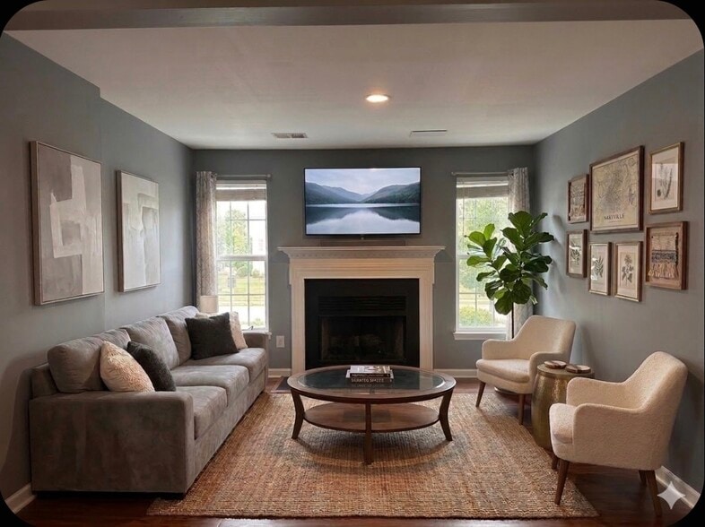 The living room has a fireplace, but the rest here is virtually staged. - 7837 Heaton Way