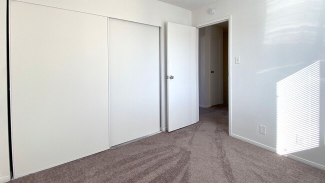 Building Photo - Great 3 bedroom and 1.5 bath townhouse with a small yard and 2 car garage.