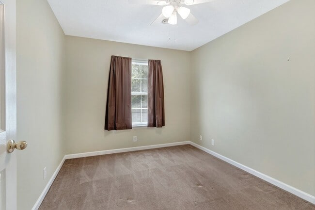Building Photo - One acre lot with first floor suite in bea...
