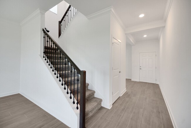 Building Photo - Stunning 4/3 in Gated Dora Parc! Water Views!