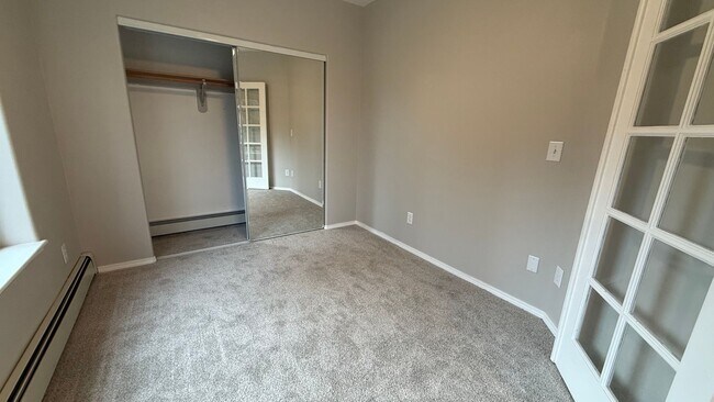 Building Photo - Major Updates! Raised Ranch Style Condo wi...