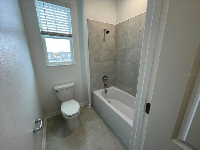 Building Photo - 6098 Blissful St