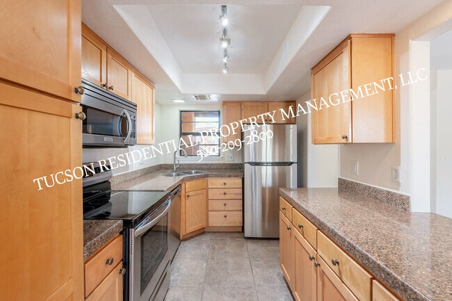 Building Photo - 6651 N Campbell Ave