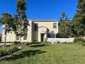 Building Photo - Stunning 3-Bed/2.5-Bath End Unit Condo with Solar & Large Yard