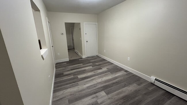 Building Photo - Recently Updated 3BR Townhouse | 2 Parking Spots | Prime Dover Location | $2,300/mo