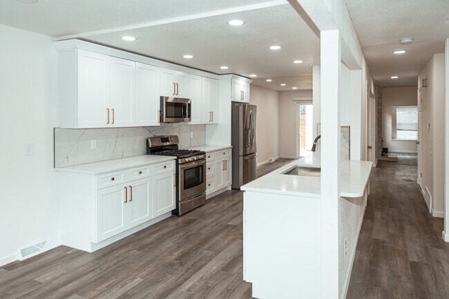Building Photo - 7355 S Garfield Ct