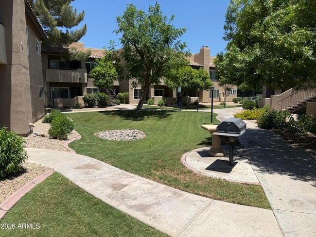 Building Photo - 9451 E Becker Ln