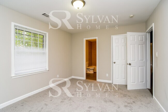 Building Photo - You'll love this charming brick home!