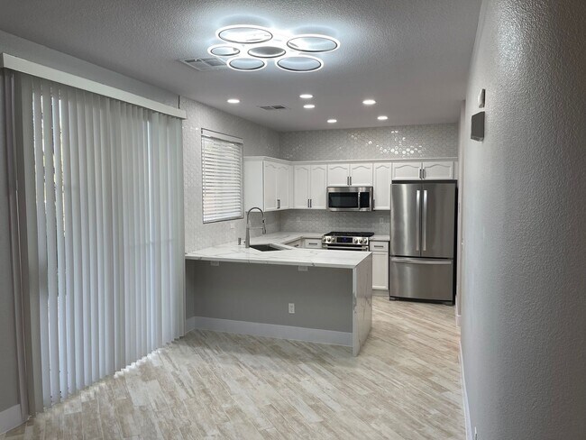 Building Photo - **GORGEOUSLY REMODELED & CLEAN!!  3BD-2 1/2BA HOME IN SILVERADO RANCH !!  *** ONLY $2,190 ***