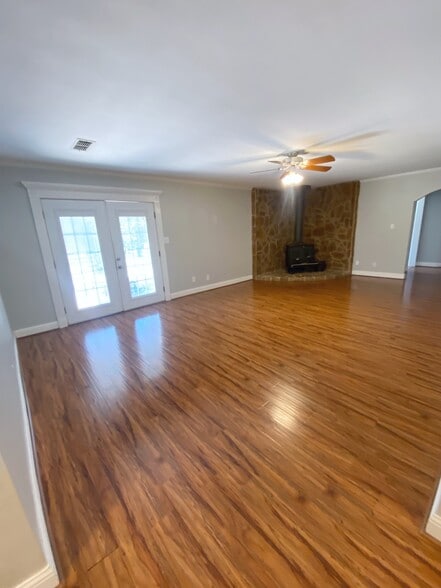 Living room leads to covered outside porch - 13372 FM 2710