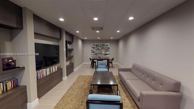 Building Photo - 3675 N Country Club Dr