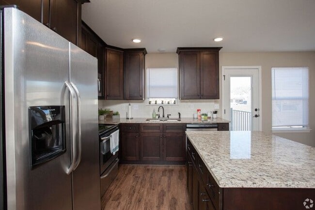 Building Photo - Serrano Townhomes with a finished basement...